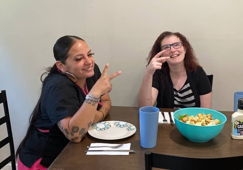 lifegroup's staff indoor cooking and have fun with an intellectual disabilities girl