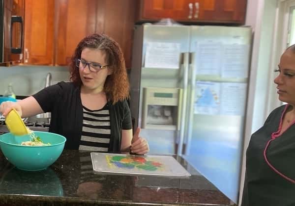 an intellectual disabilities girl cooking